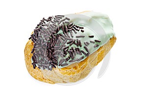 French pastry filled with vanilla cream, glaze with mint and chocolate chips on