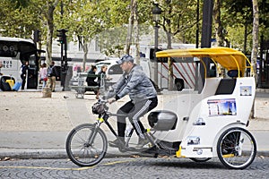 French people biking bicycle rickshaw waiting travelers use service
