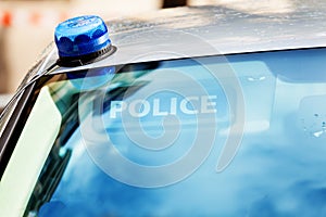 French police car siren on the roof and sign