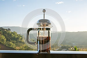 French press coffee pot  with mountain view