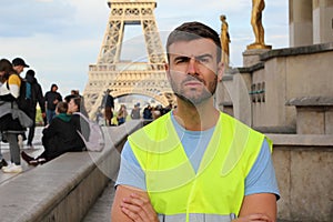 French protester in front of the Eiffel Tower