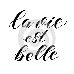 French quote La vie est Belle meaning Life is beautiful.