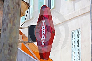 French Red And White Modern Tabac Sign - Close Up View photo