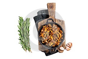 French roasted chanterelle mushrooms with onions and thyme in a pan. Isolated on white background, top view.