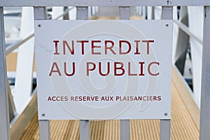 French sign with the words: forbidden to the public, acces reserved to boaters