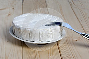 French soft cheese Coulommiers of the Brie family with a bloomy rind photo