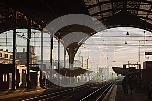 French Strasbourg train station with people at sunset