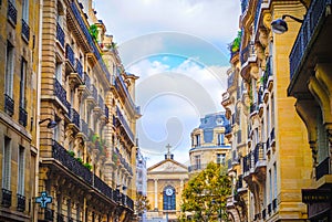 French street in Paris with a church