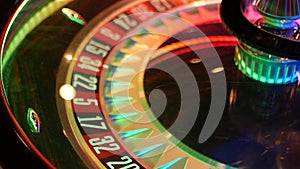 French style roulette table for money playing in Las Vegas, USA. Spinning wheel with black and red sectors for risk game
