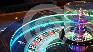 French style roulette table for money playing in Las Vegas, USA. Spinning wheel with black and red sectors for risk game of chance