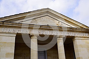 French text liberte egalite fraternite mairie means liberty equality fraternity and town hall in official facade building in