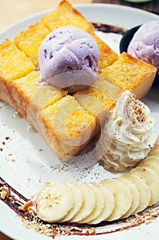 French toast with banana,ice cream,whipping cream,