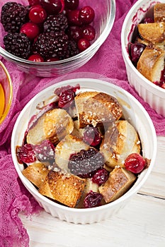 French toast casserole with cranberries, raspberries and blackberries