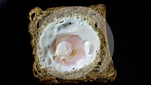 French Toast With An Egg Inside In A Pan. Traditional French Dish Croque-Madame .French Breakfast