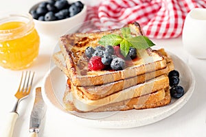 French toast with fresh berries and honey