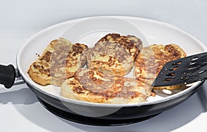 French toast frying in fry pan.