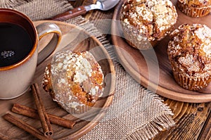 French Toast Muffin With Cinnamon Sticks and Cup of Coffee