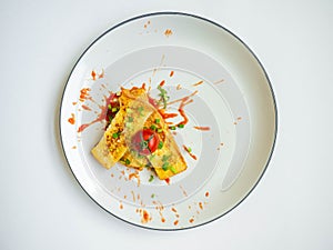 French Toast topping Spring onion Tomato Eaten with ketchup on dish white ingredient Bread Egg,Background Color