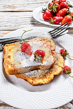 French Toasted with strawberry. Healthy Breakfast. White background. Top view