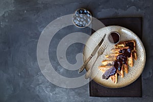 French toasts with blueberry jam for breakfast