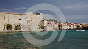 French the town and castle of Collioure part of the coast on a Sunny day