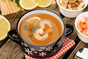 French traditional fish soup bisque with lobster and shrimps