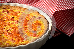 French traditional quiche Lorraine with onion, eggs and bacon