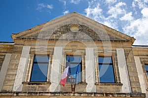 French tricolor and europa flag on mairie text building mean town hall in city center in france