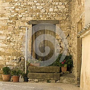 French Village, old door in street.