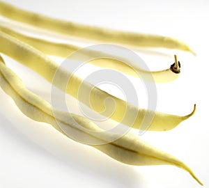 French Yellow Beans called Mange Tout Beans, phaseolus vulgaris, Vegetables against White Background