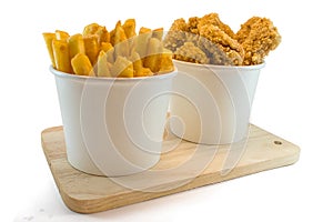 Frenchfries and nuggets in paper boxes