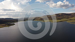 Frenchman Lake reservoir in California west shore drone high POV photo lots of clouds in the sky