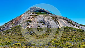 Frenchman Peak is a distinctively shaped rocky peak with a cave and a steep trail to the summit