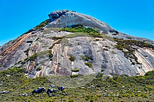 Frenchman Peak is a distinctively shaped rocky peak with a cave and a steep trail to the summit