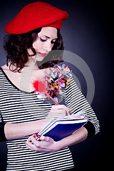 Frenchwoman with notebook
