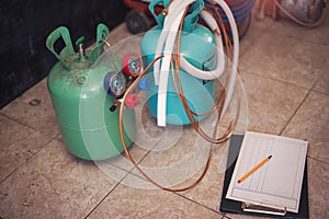 Freon gas balloons with pressure meter