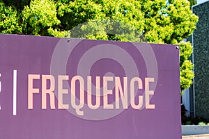 Frequence sign at marketing and advertising software company headquarters