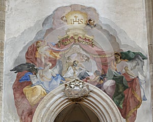 Fresco at entrance to Franciscus Xaverius Chapel, Interior Piarist Church, Krems on the Danube, Austria photo