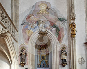 Fresco at entrance to Franciscus Xaverius Chapel, Interior Piarist Church, Krems on the Danube, Austria photo