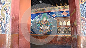 Fresco of a guarding deity at the entrance to a monastery in Bhutan