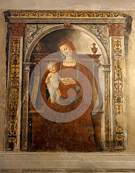 Fresco Holy Virgin Mary child Christ Pubblico, Siena, Italy, night