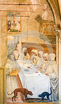 Fresco in Monte Oliveto Maggiore - Supper in a Monastery photo