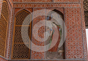 Fresco of a Persian Woman on portico of historical Ali Qapu Palace on west side of Naghsh-e Jahan Square, Isfahan