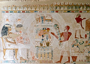 Fresco in TT69 with Menna and Henut-Tawy seated at a ceremonial meal.