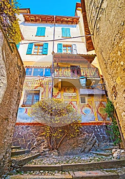 The frescoed house in medieval Castello, Valsolda, Italy photo