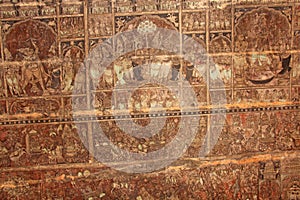 Frescoes and ancient drawings paintings and scenes on the ceiling in Shiva Virupaksha Temple. Ancient terracotta patterns