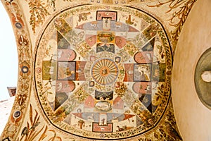 Frescos on arches of Chigi Saracini palace at Siena