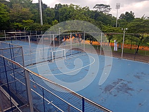 Fresh Air Futsal: Experience the invigorating ambiance of this futsal field surrounded by lush trees, offering a breath of fresh