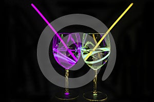 Fresh alcoholic transparent beverages in wine glass with dark background for party celebration, new year, bar and christmas with