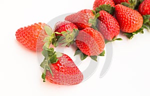 Fresh appetizing strawberries on a white background